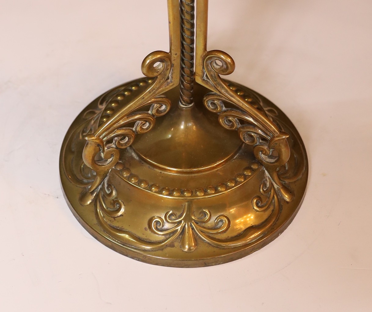 A late Victorian brass and cut glass oil lamp with duplex mechanism and frosted glass shade, height overall 65cm